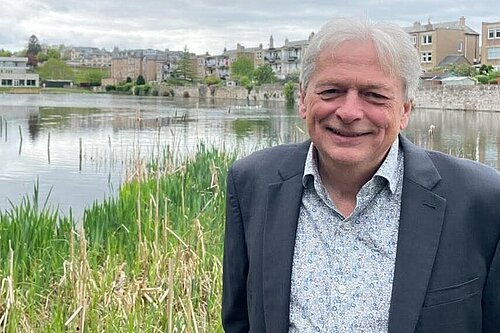 Kevin McKay standing in front of the Union Canal