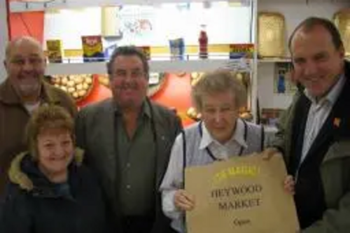 Simon Hughes MP alongside Councillors Peter Rush, Doreen Brophy-Lee, Malcolm Bruce and Heywood stall holder Iris.