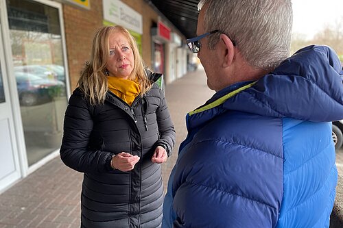 Liz speaks to pensioner