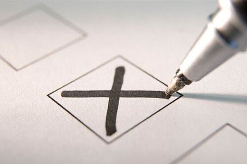 A cross on a ballot