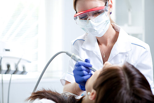 A dentist at work