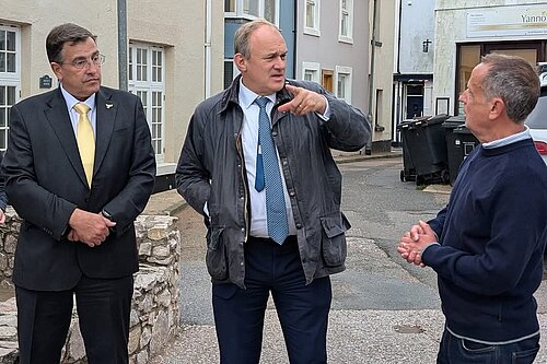 Martin Wrigley and Ed Davey talk to a constituent