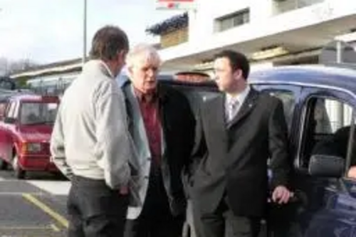 Jonathan Lees & Colin Taylor outside Epsom Station with a Taxi Operator