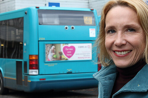 Helen with a local bus